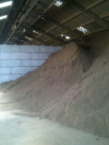 Legato Interlocking Blocks for Aggregate and Bulk Material Storage