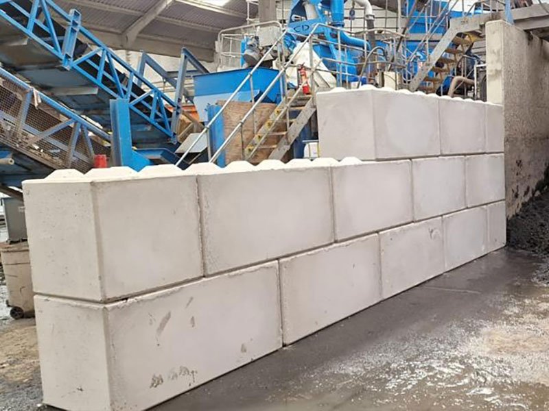 Legato block wall separating a washing plant from the stockpile area